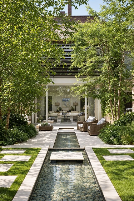 Jardin contemporain avec bassin rectiligne et dalles